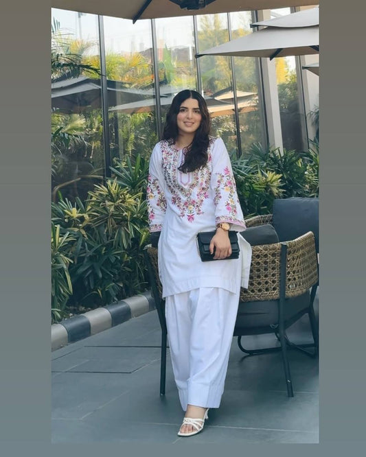 Elegant White Ensemble in Pure Natural Crepe Silk with Dupatta and Embroidery Details