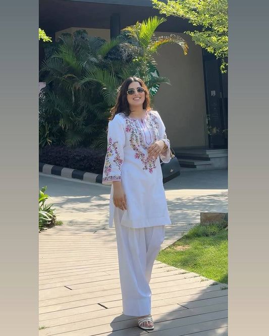 Elegant White Ensemble in Pure Natural Crepe Silk with Dupatta and Embroidery Details