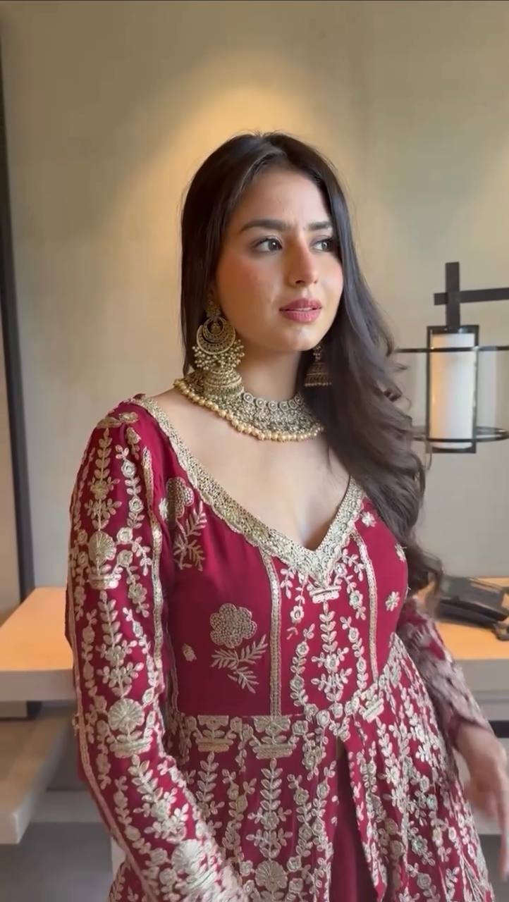 Turn Heads with This Three Piece Designer Set Featuring a Faux Georgette Lehenga and Top with a Breathable Micro Cotton Lining