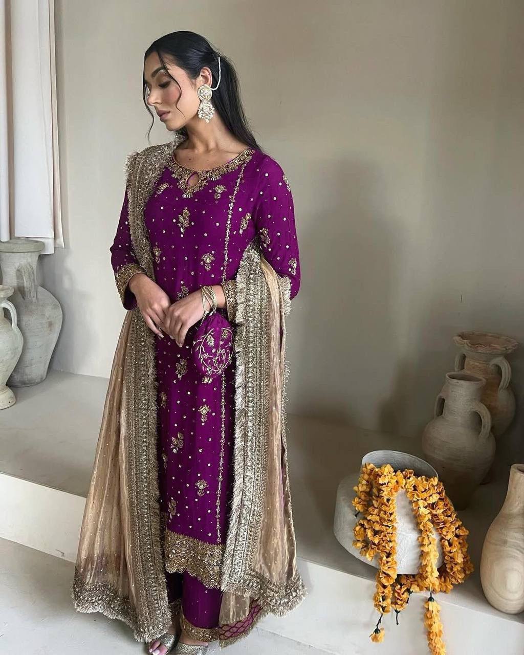 Elegant Faux Georgette Top and Pant with Intricate Sequence & Moti Embroidery Paired with Heavy Lace Net Dupatta