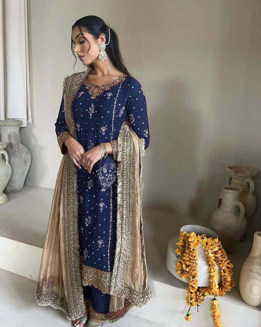 Elegant Faux Georgette Top and Pant with Intricate Sequence & Moti Embroidery Paired with Heavy Lace Net Dupatta