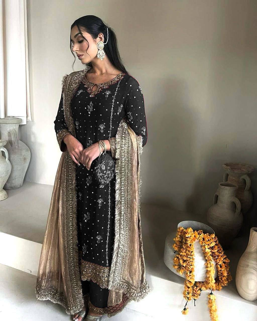 Elegant Faux Georgette Top and Pant with Intricate Sequence & Moti Embroidery Paired with Heavy Lace Net Dupatta