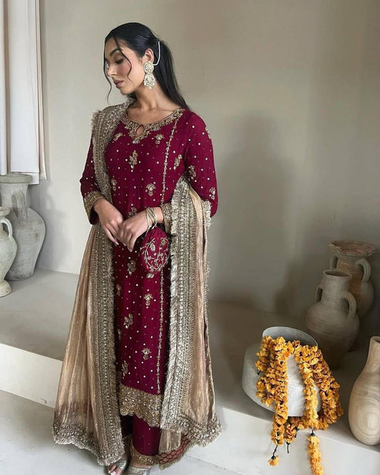 Elegant Faux Georgette Top and Pant with Intricate Sequence & Moti Embroidery Paired with Heavy Lace Net Dupatta