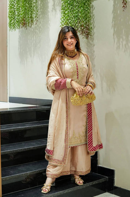 Artisan Craftsmanship Behind the Heavy Embroidery and Fabric Quality of This Party Wear Set