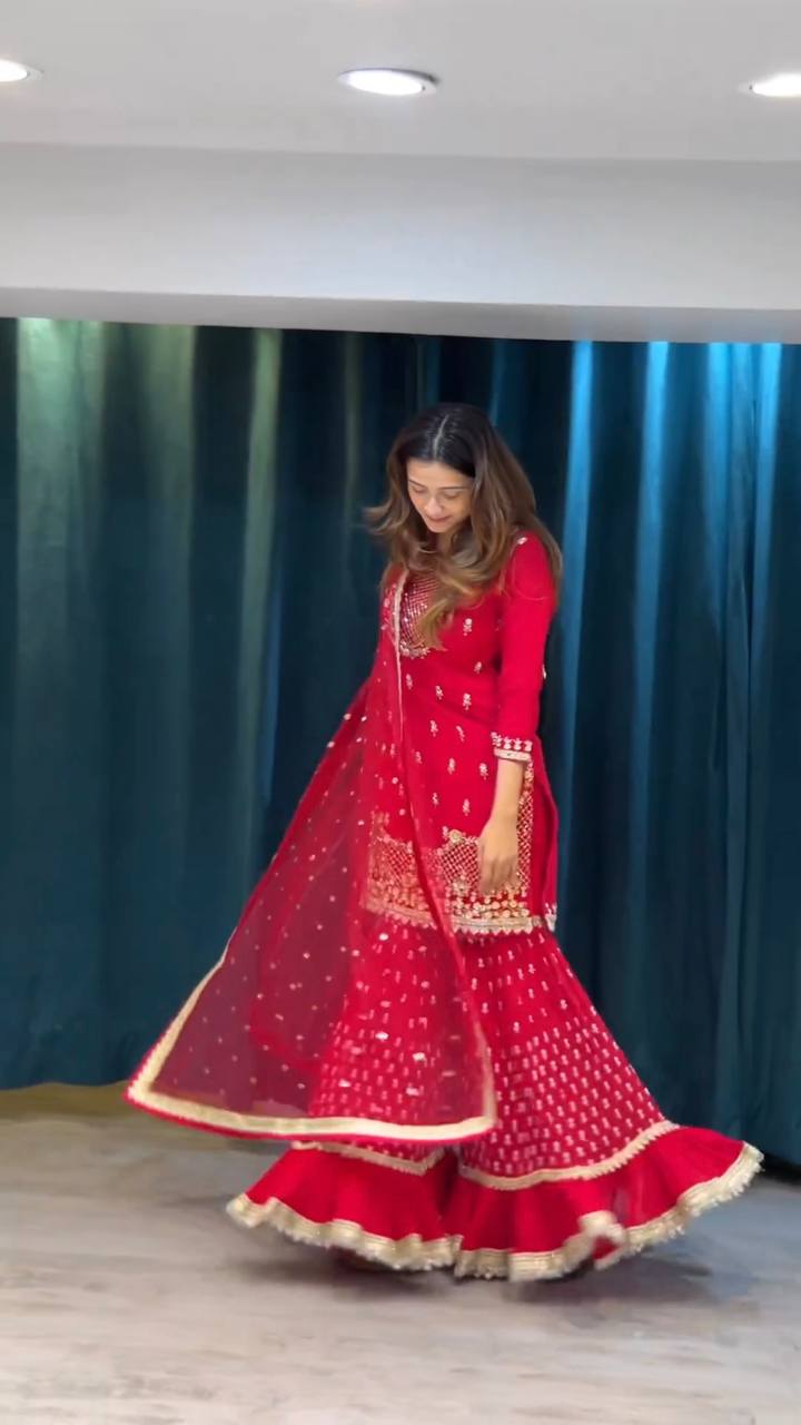 Complete Ethnic Set Including a Beautifully Embroidered Top, Flowy Sharara, and Dupatta