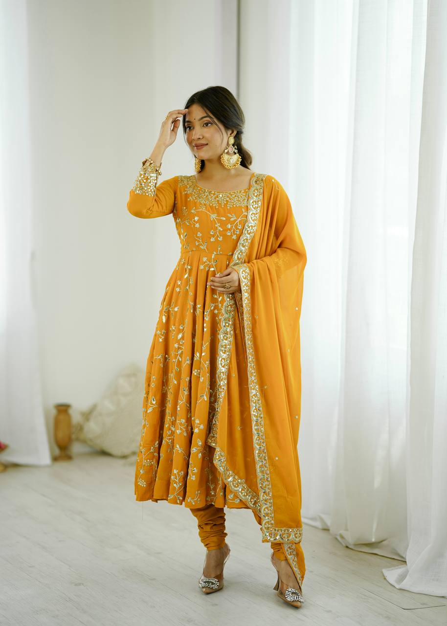 Traditional Anarkali Gown in Faux Georgette with Intricate Embroidery and Full Flair with Matching Cotton Churidar