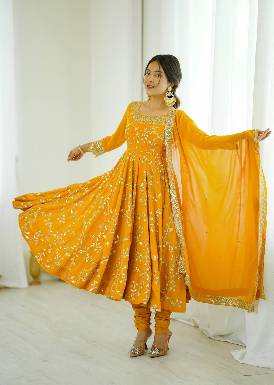 Traditional Anarkali Gown in Faux Georgette with Intricate Embroidery and Full Flair with Matching Cotton Churidar