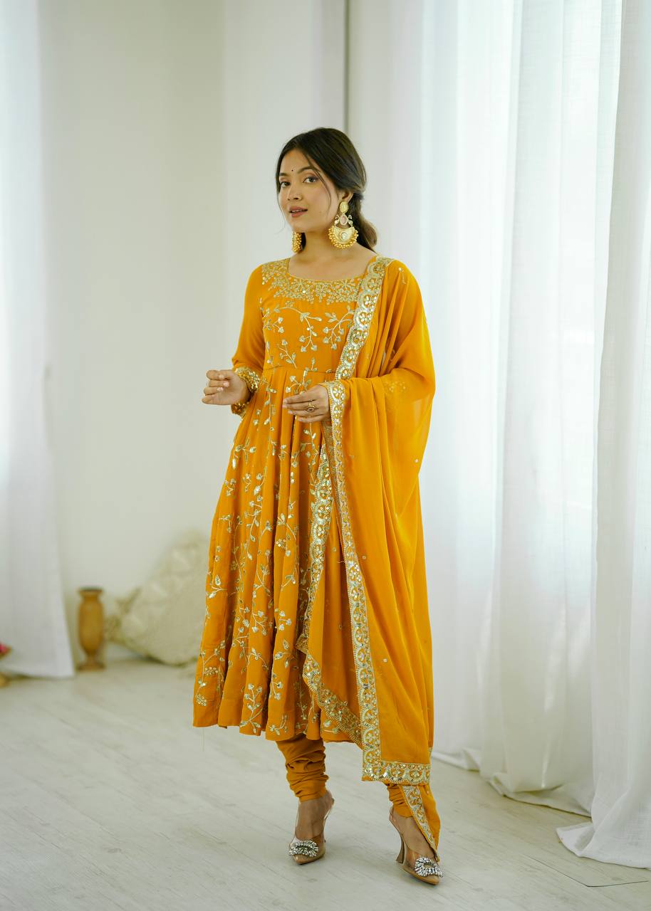 Traditional Anarkali Gown in Faux Georgette with Intricate Embroidery and Full Flair with Matching Cotton Churidar