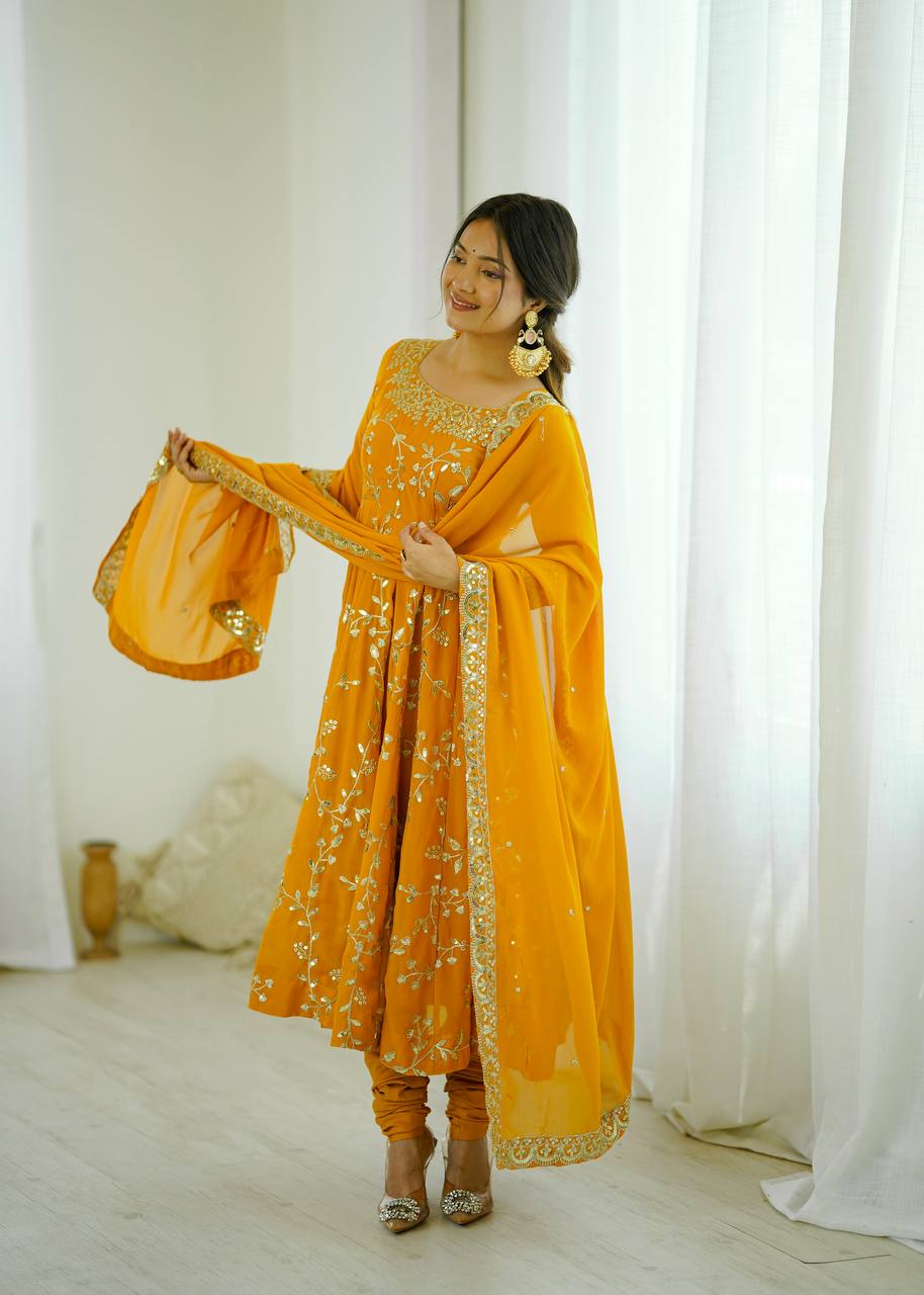 Traditional Anarkali Gown in Faux Georgette with Intricate Embroidery and Full Flair with Matching Cotton Churidar
