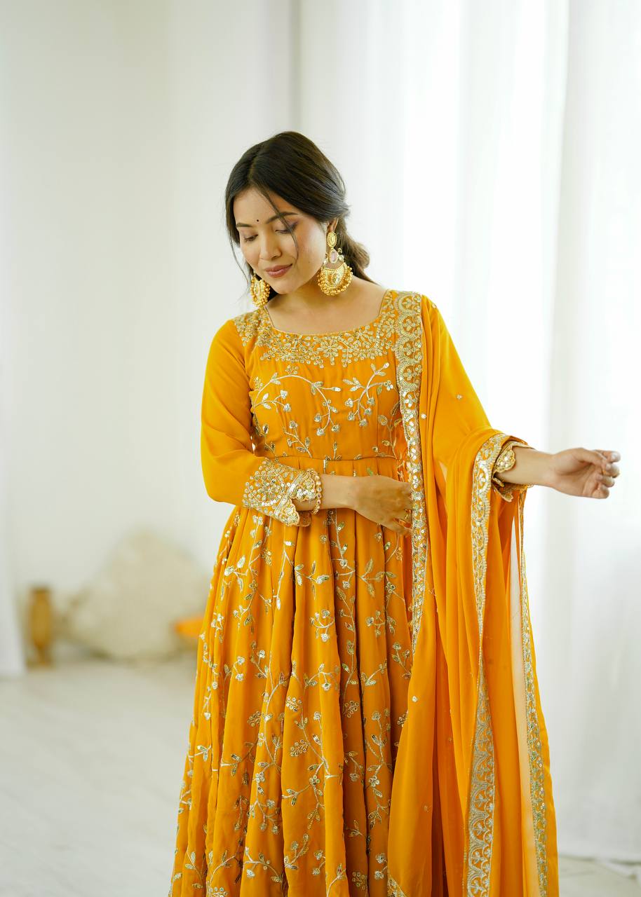 Traditional Anarkali Gown in Faux Georgette with Intricate Embroidery and Full Flair with Matching Cotton Churidar