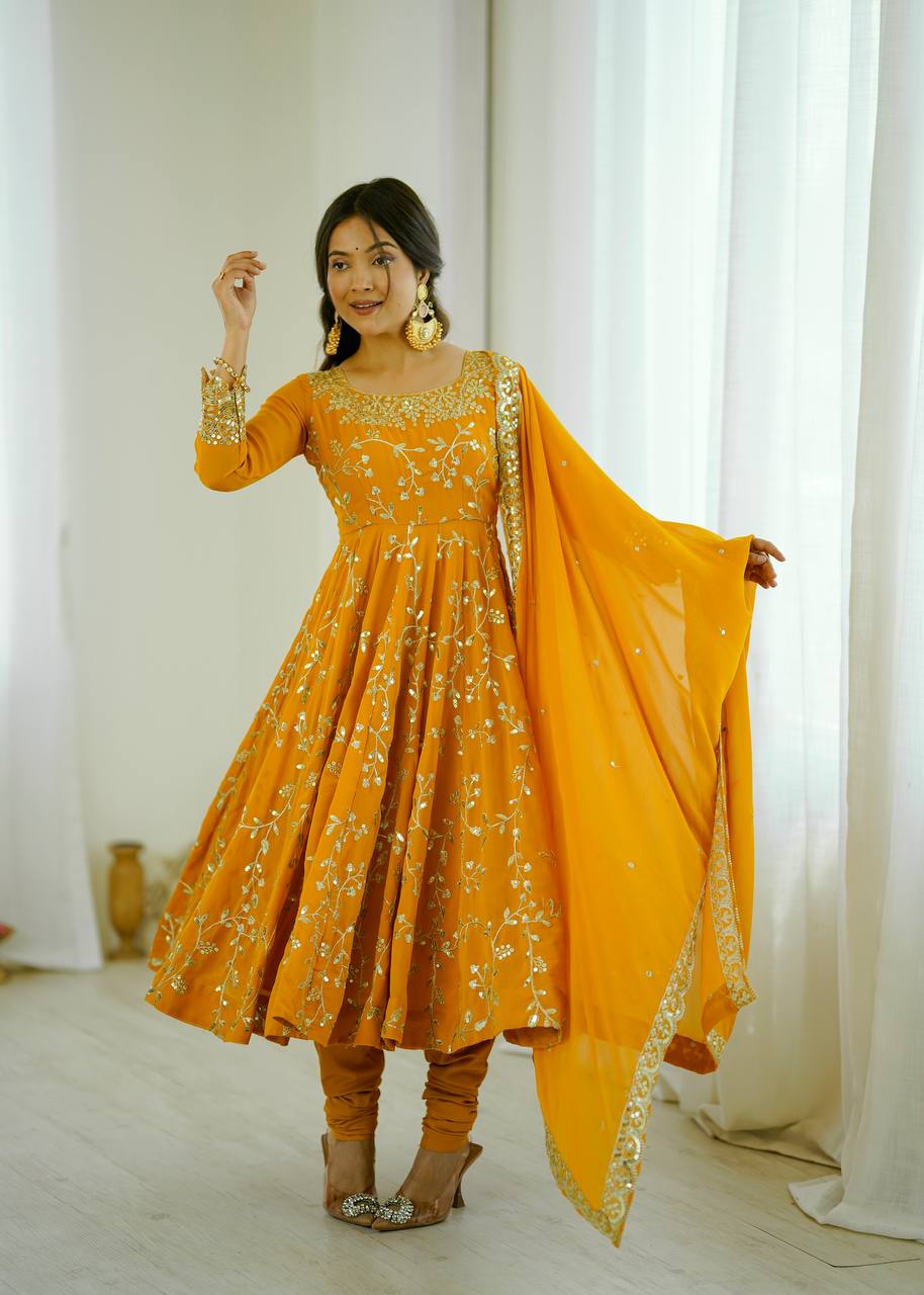 Traditional Anarkali Gown in Faux Georgette with Intricate Embroidery and Full Flair with Matching Cotton Churidar