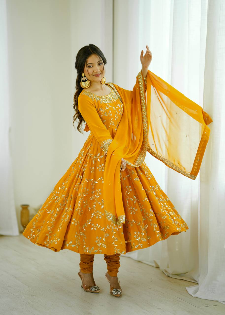 Traditional Anarkali Gown in Faux Georgette with Intricate Embroidery and Full Flair with Matching Cotton Churidar