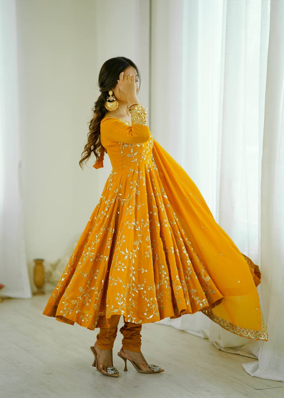 Traditional Anarkali Gown in Faux Georgette with Intricate Embroidery and Full Flair with Matching Cotton Churidar