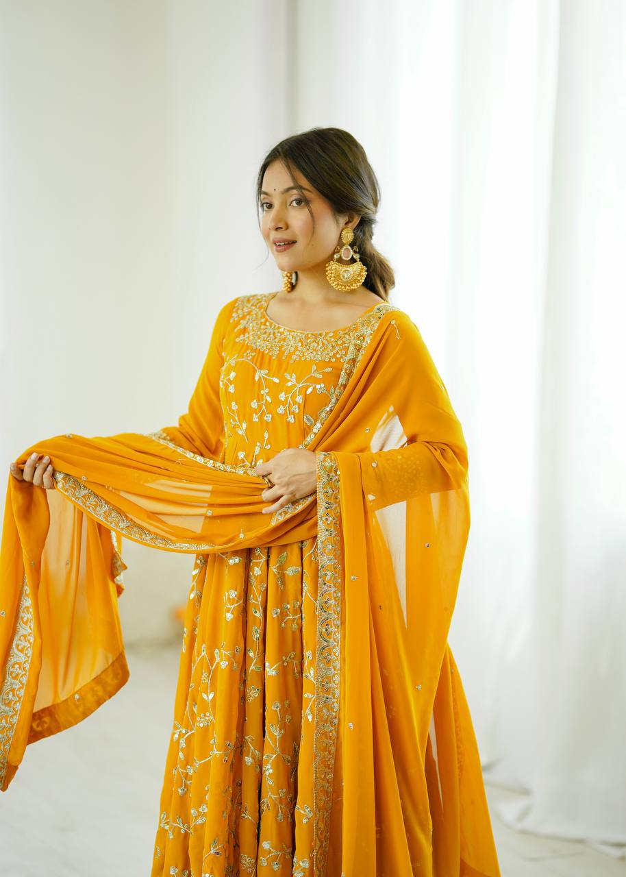Traditional Anarkali Gown in Faux Georgette with Intricate Embroidery and Full Flair with Matching Cotton Churidar