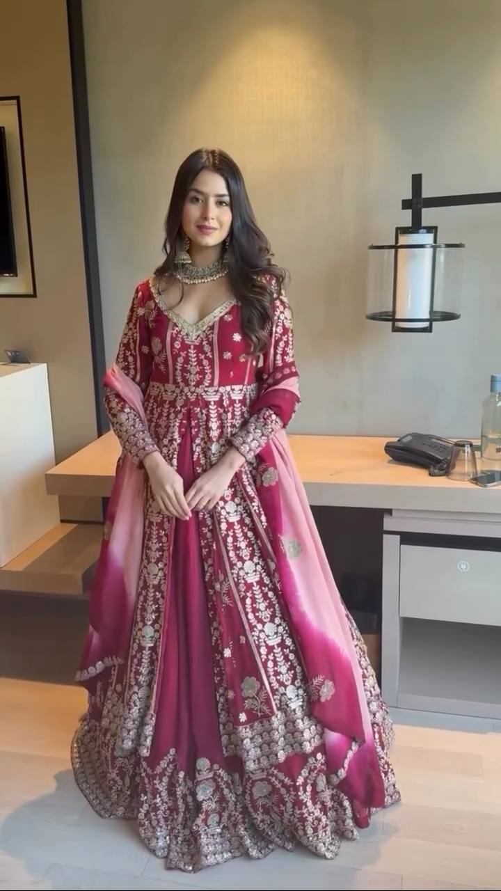 Turn Heads with This Three Piece Designer Set Featuring a Faux Georgette Lehenga and Top with a Breathable Micro Cotton Lining