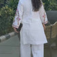 Elegant White Ensemble in Pure Natural Crepe Silk with Dupatta and Embroidery Details